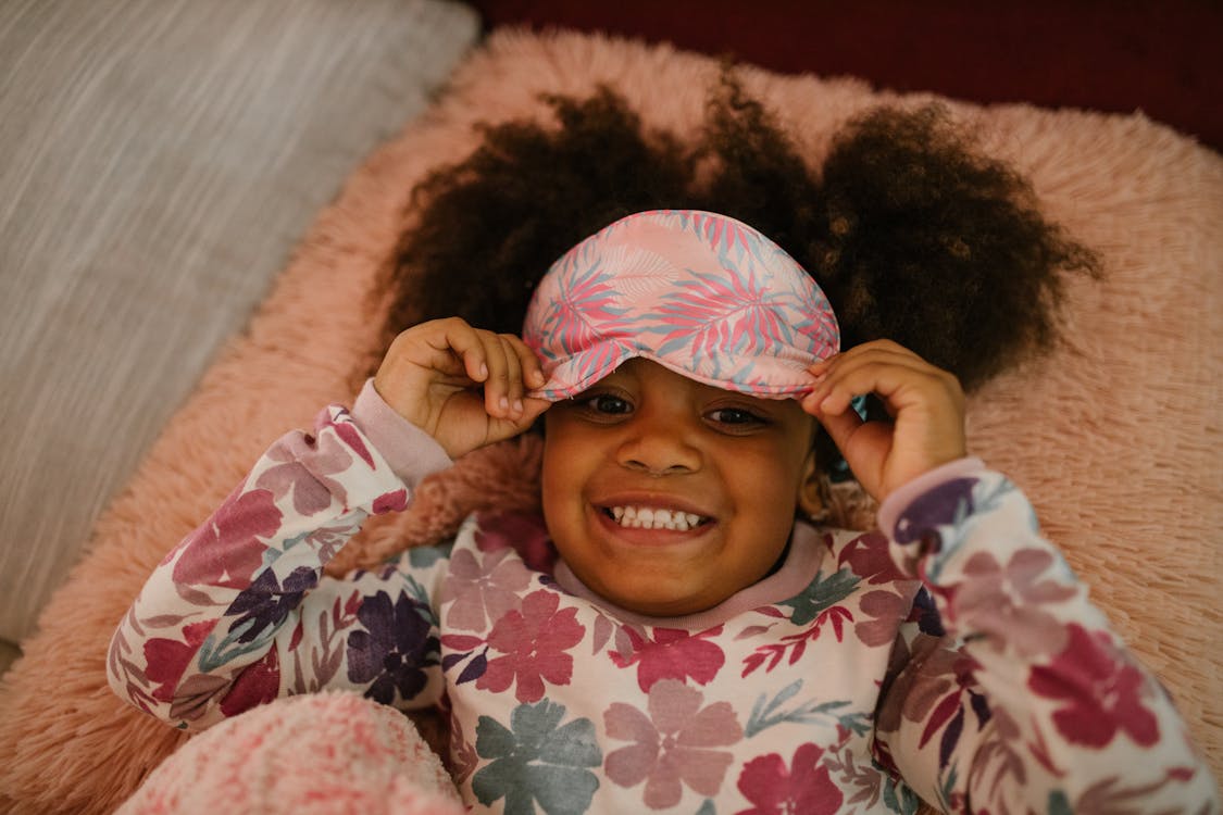 Free Cheerful Child during Bedtime Stock Photo