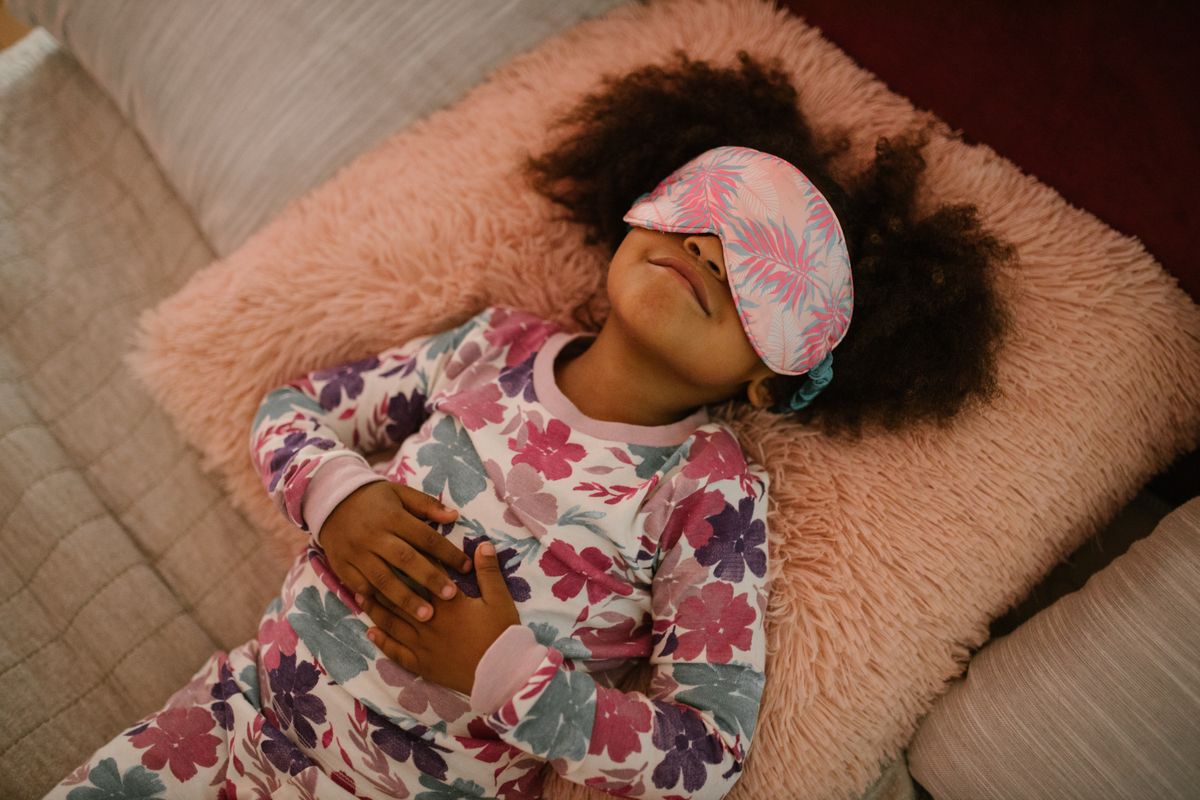 Child sleeping comfortably after tonsil evaluation
