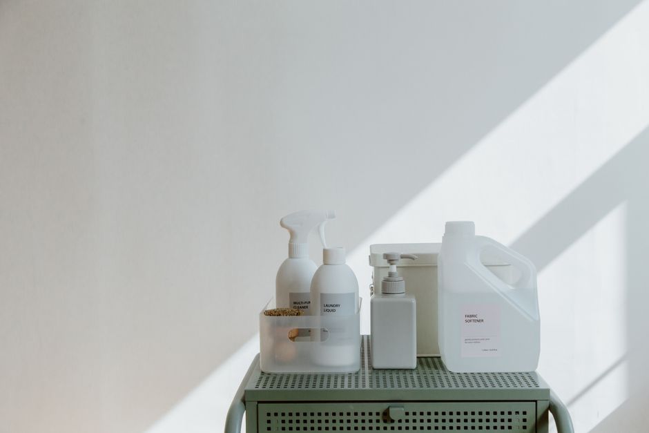 Aesthetic arrangement of cleaning products in minimalistic containers with soft shadow play. - Long Term Value and Maintenance