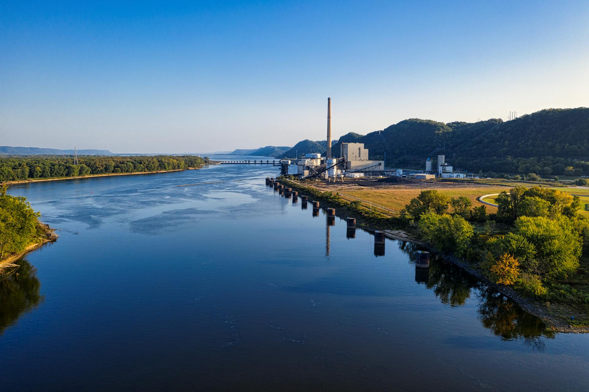 Aerial view of an industrial plant by the Mississippi River in Genoa, WI.