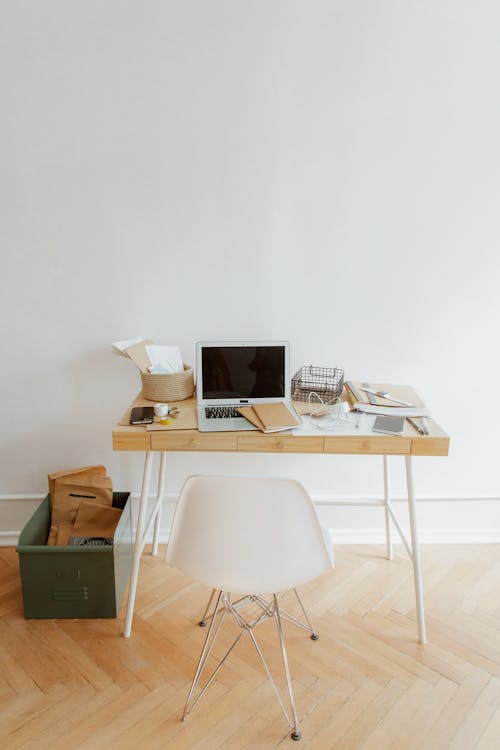 Free Desk With Laptop and Office Supplies Stock Photo