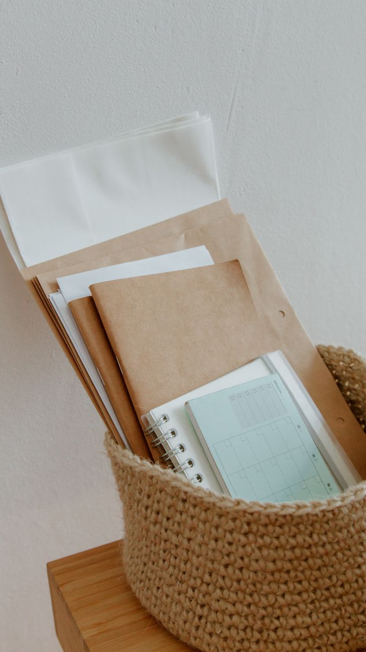 seagrass woven basket holding bags of coffee beans and extra mugs