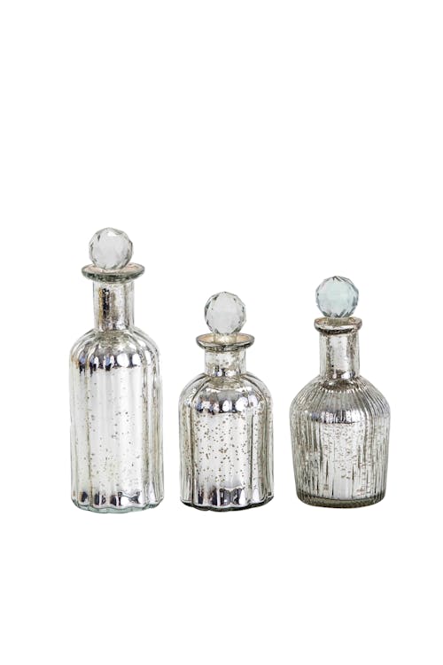 Fotos de stock gratuitas de botella de decoración, botella de plata, botella de vidrio