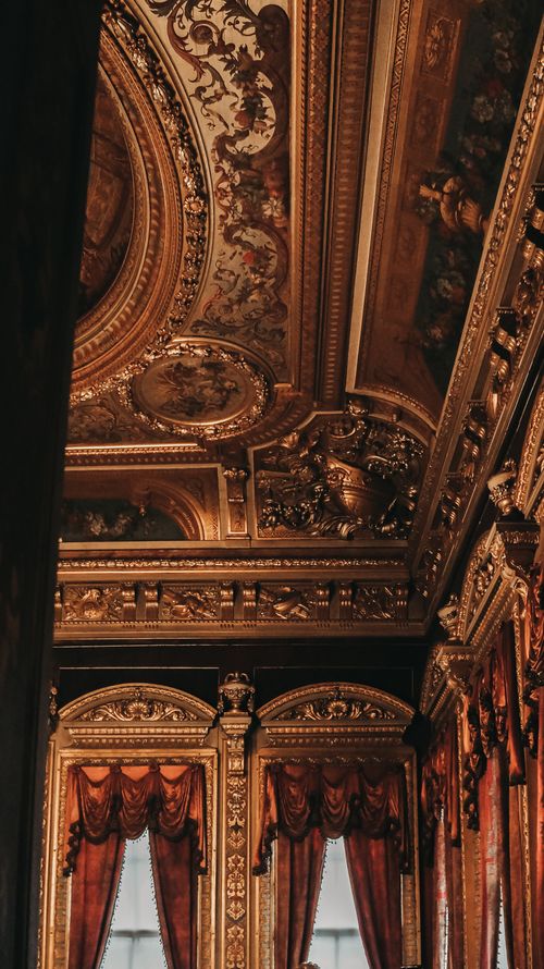 Free Intricate gold-lined ceiling of Dolmabahçe Palace in Istanbul, showcasing opulent design. Stock Photo
