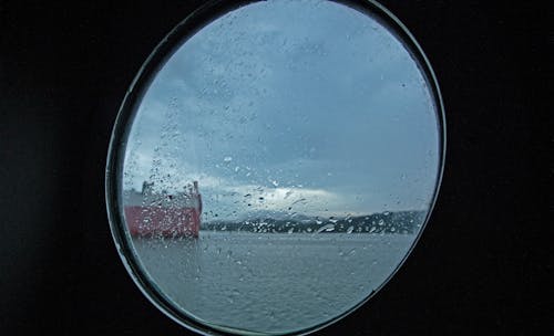 Foto profissional grátis de envio, janela, mar