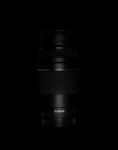 A Canon Camera Lens on Dark Background