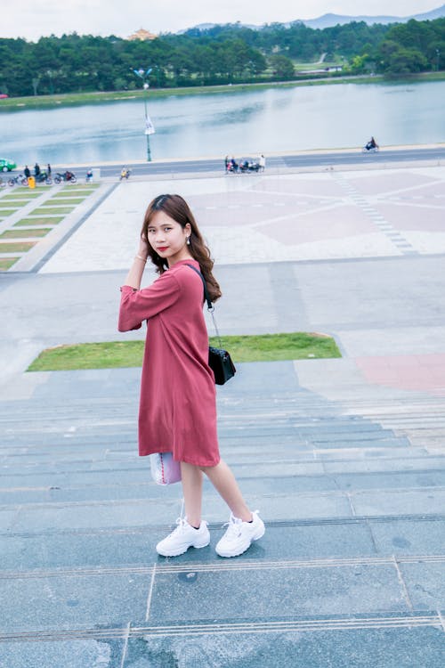 Free Woman Wearing Pink 3/4-sleeved Midi Dress Stock Photo