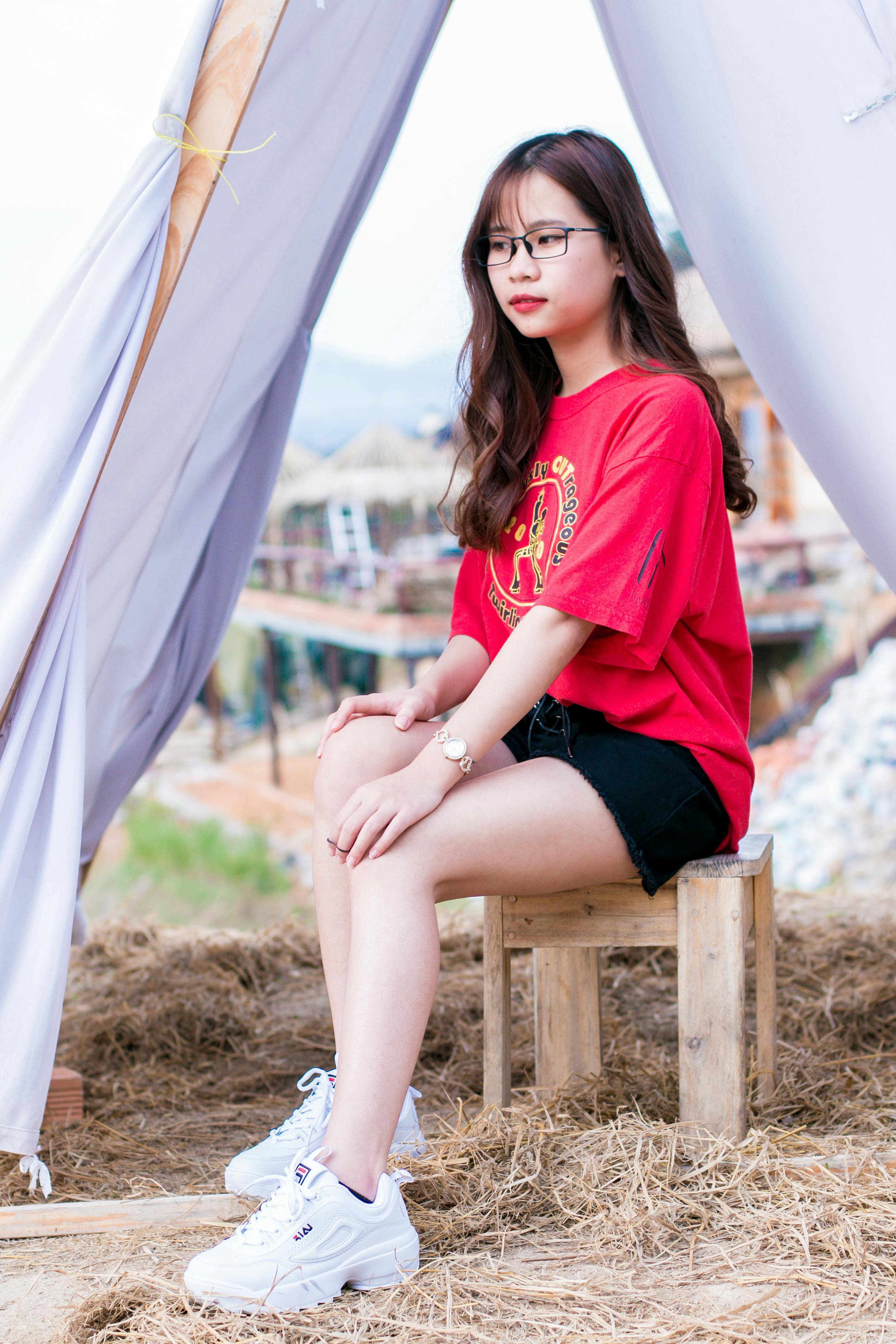 Woman in Red T-shirt and Black Denim Shorts \u00b7 Free Stock Photo