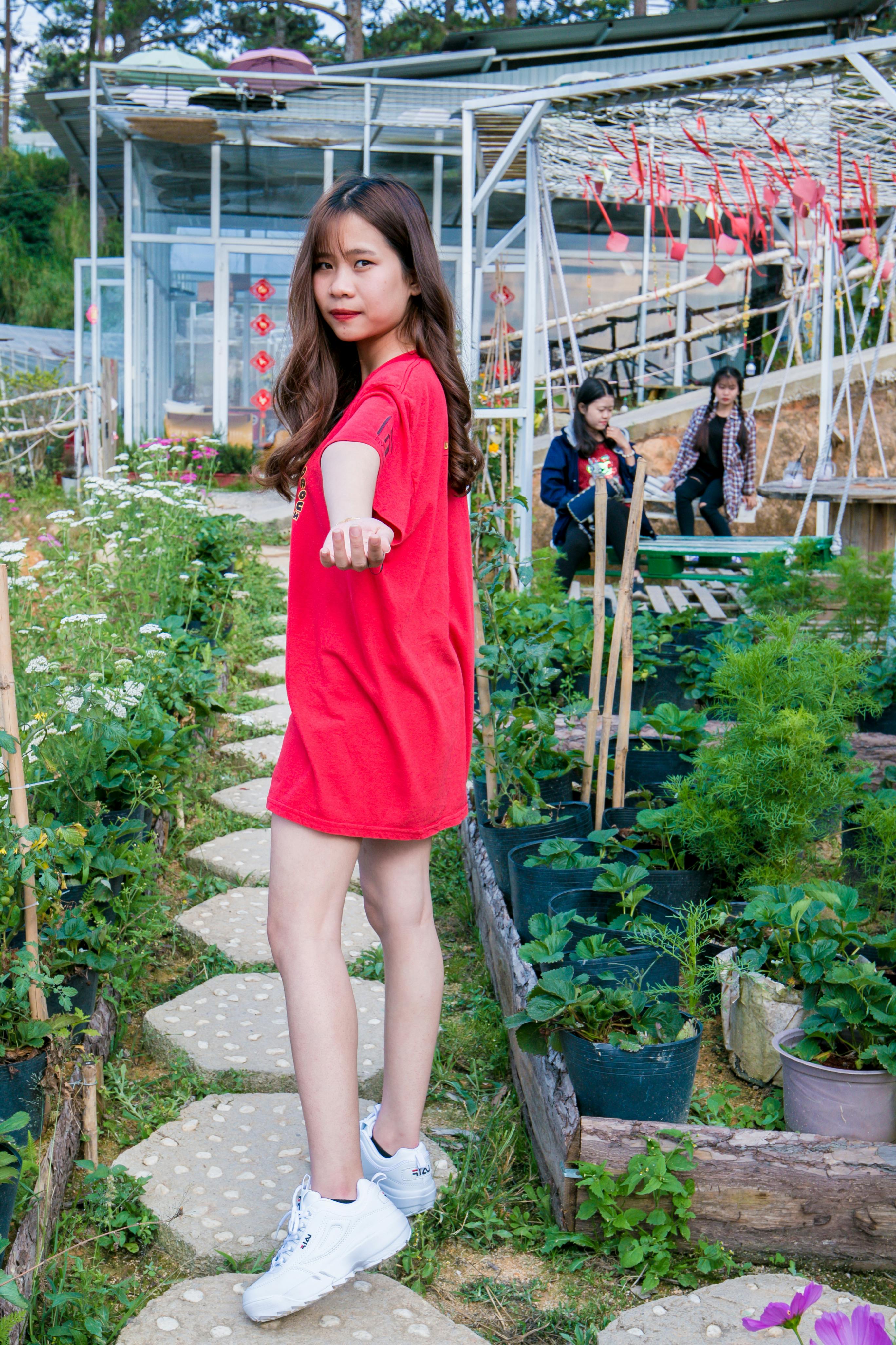 woman wearing red dress