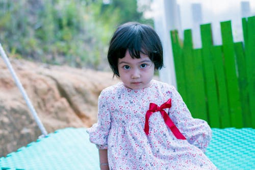 Free Toddler's Gray Floral Dress Stock Photo