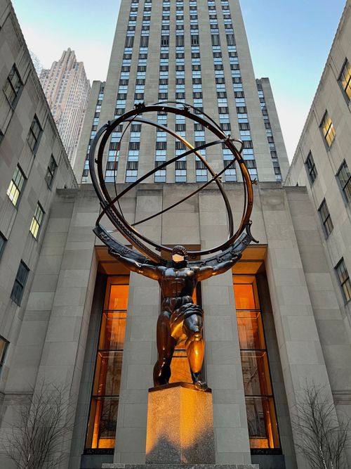 Free Iconic Atlas statue at Rockefeller Center, New York City, captured from a low angle shot. Stock Photo