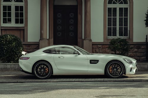 Free Side View of a White Mercedes-Benz GT-Class Stock Photo