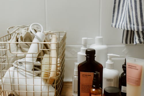 Free Basket With Hair Dryer next to Cosmetics Stock Photo