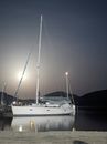 White Boat on Sea Under Gray Sky