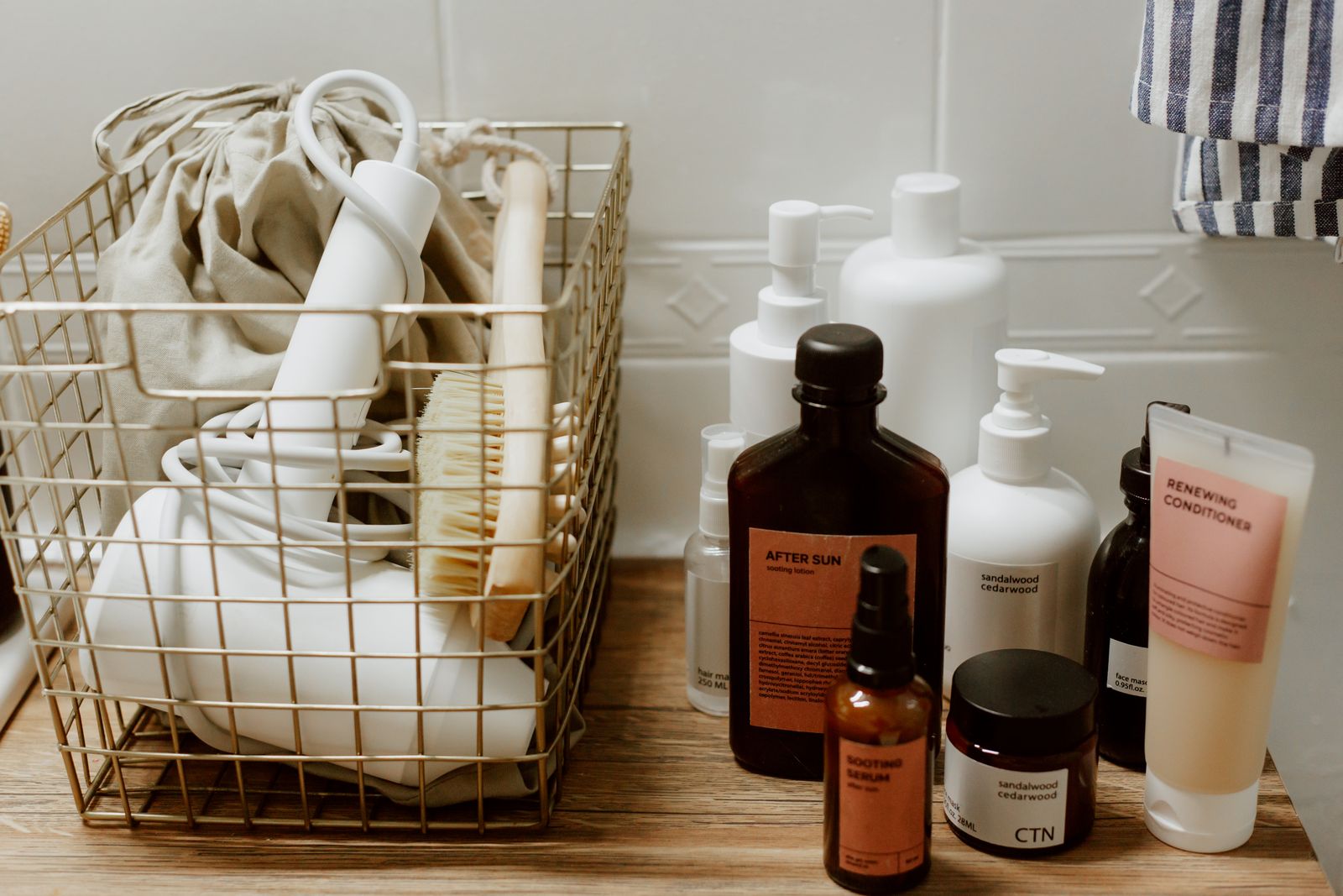 Bathroom bottles and toiletries grouped together before packing for a house move