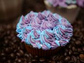 Pink Cupcake on Brown Wooden Table