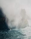 Water Falls on Rocky Shore