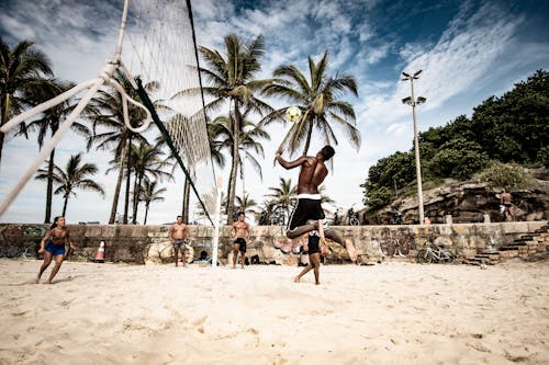 Free People Playing Beach Volleyball Stock Photo