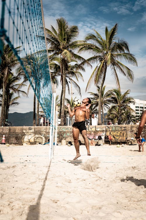 A Man Hitting the Ball Using His Chest