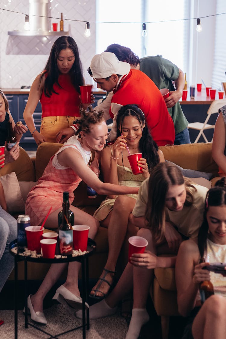 Friends Drinking At A Party