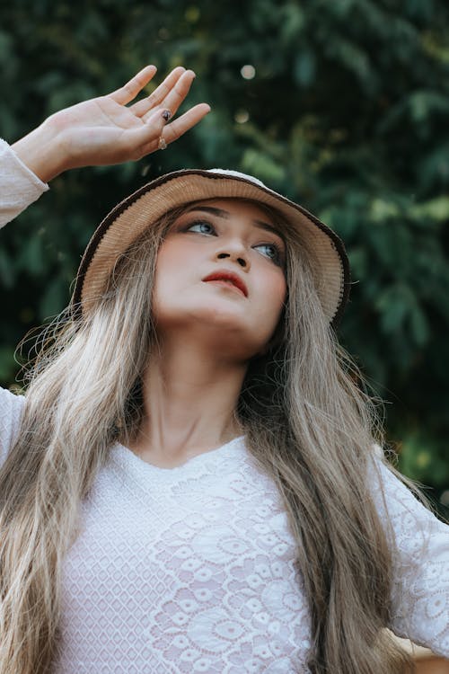 Beautiful Young Woman with Hat