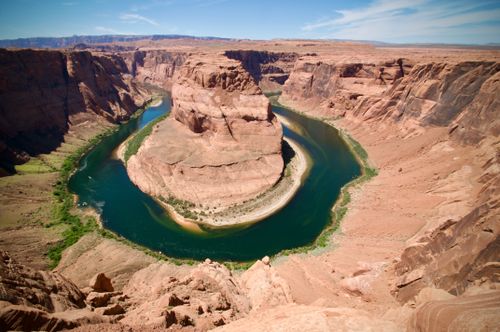 Free A breathtaking aerial view of the iconic Horseshoe Bend in Arizona, showcasing its dramatic rock formations and meandering river. Stock Photo