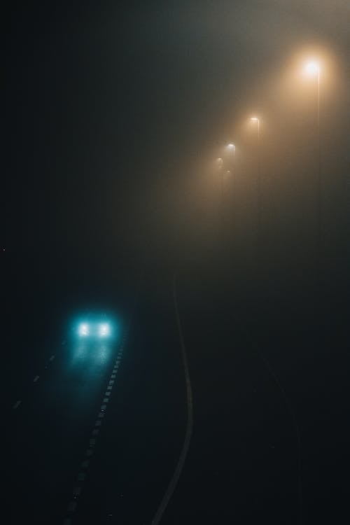 Free Car Driving in Fog  Stock Photo