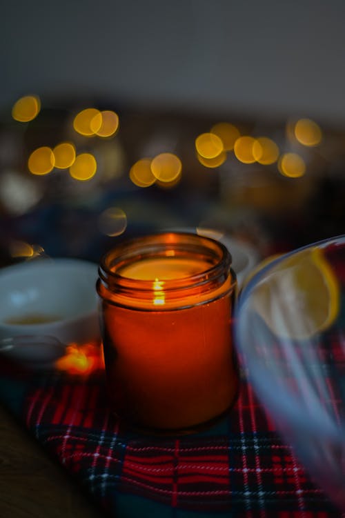 Free Close-Up Photo of Candle on Glass Stock Photo