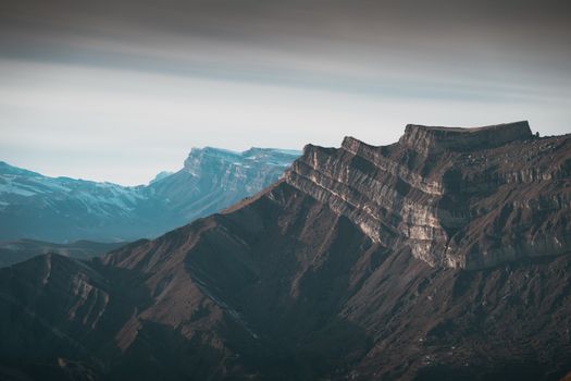 Spectacular view of an eroded mountain ridge, showcasing geological formations and rugged beauty.