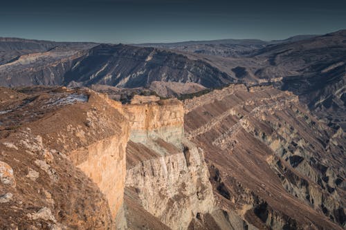 Gratis stockfoto met bergtoppen, dor, extreem terrein