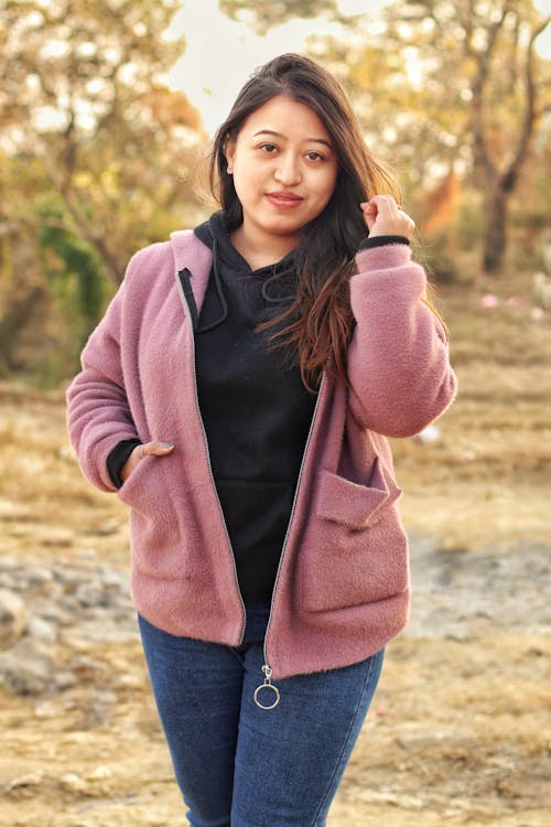 Free stock photo of black hoodie, blue jeans, female portrait