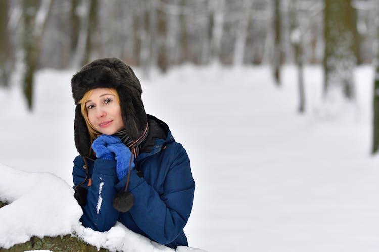 Woman Posing In Trapper Hat