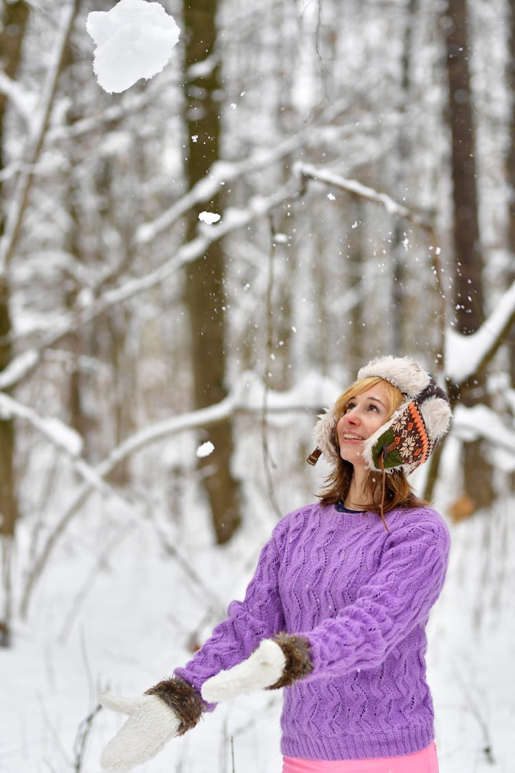 Woman In Sweater In Snow