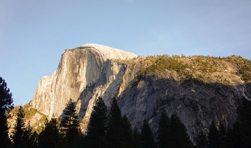 Free Stunning view of Half Dome in Yosemite Valley during sunset, highlighting its majestic rock face. Stock Photo