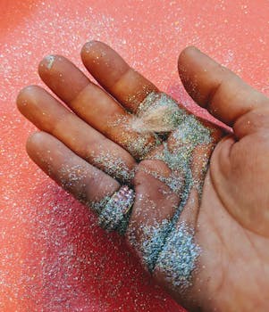 Person Holding Grey Glitter