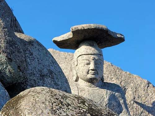 Free A Statue of Gatbawi Rock Under Blue Sky Stock Photo