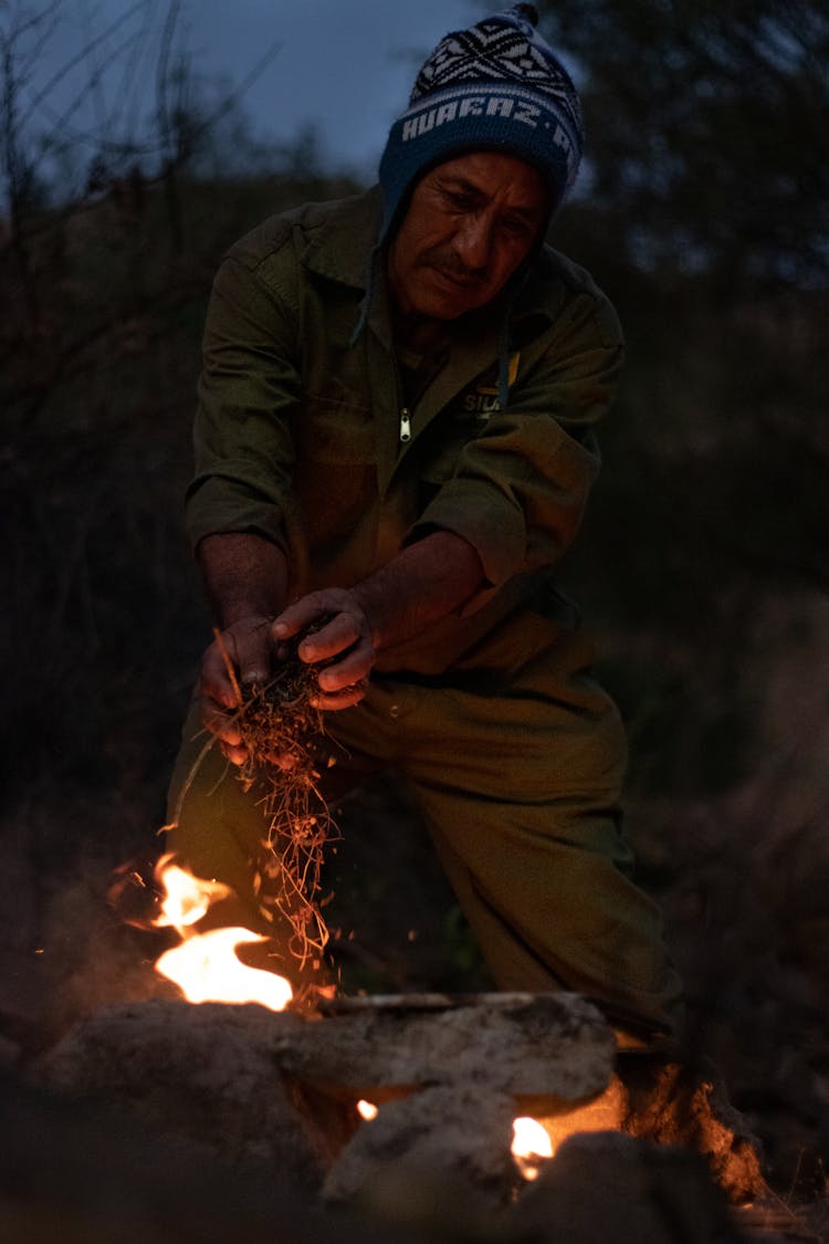 Man By Campfire