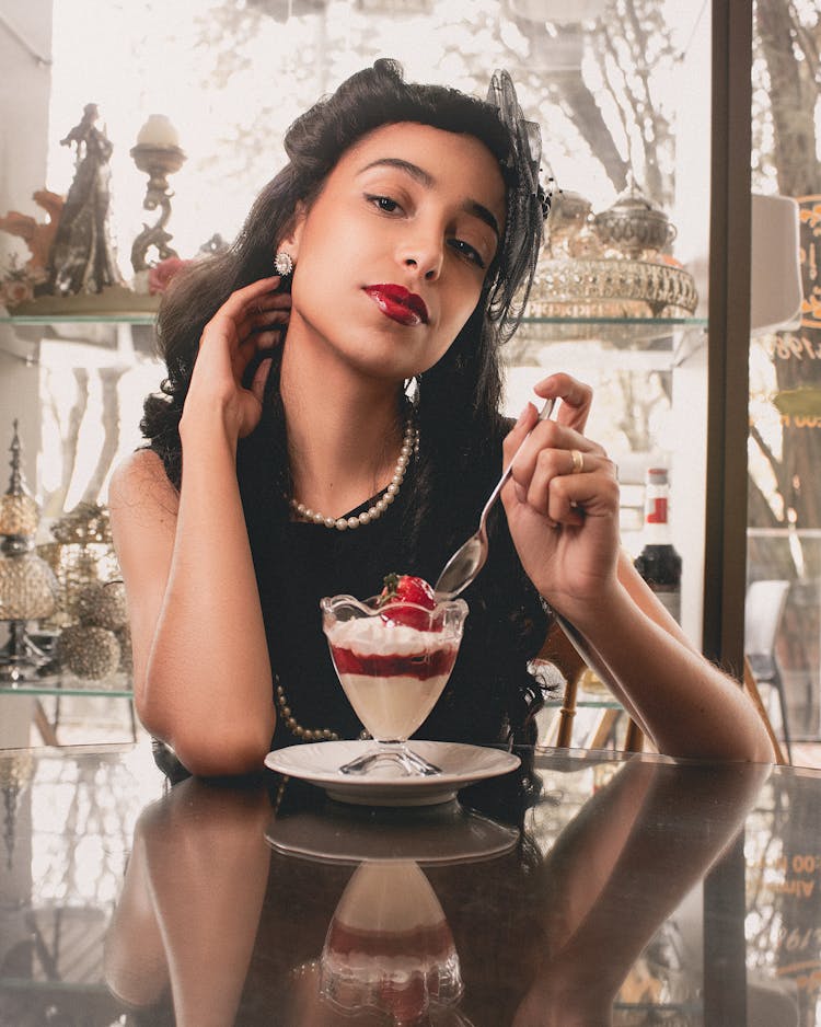 Vintage Style Woman Eating Dessert