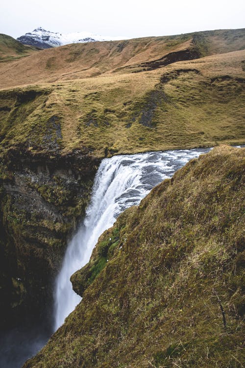 Waterfalls Beside a Mountain