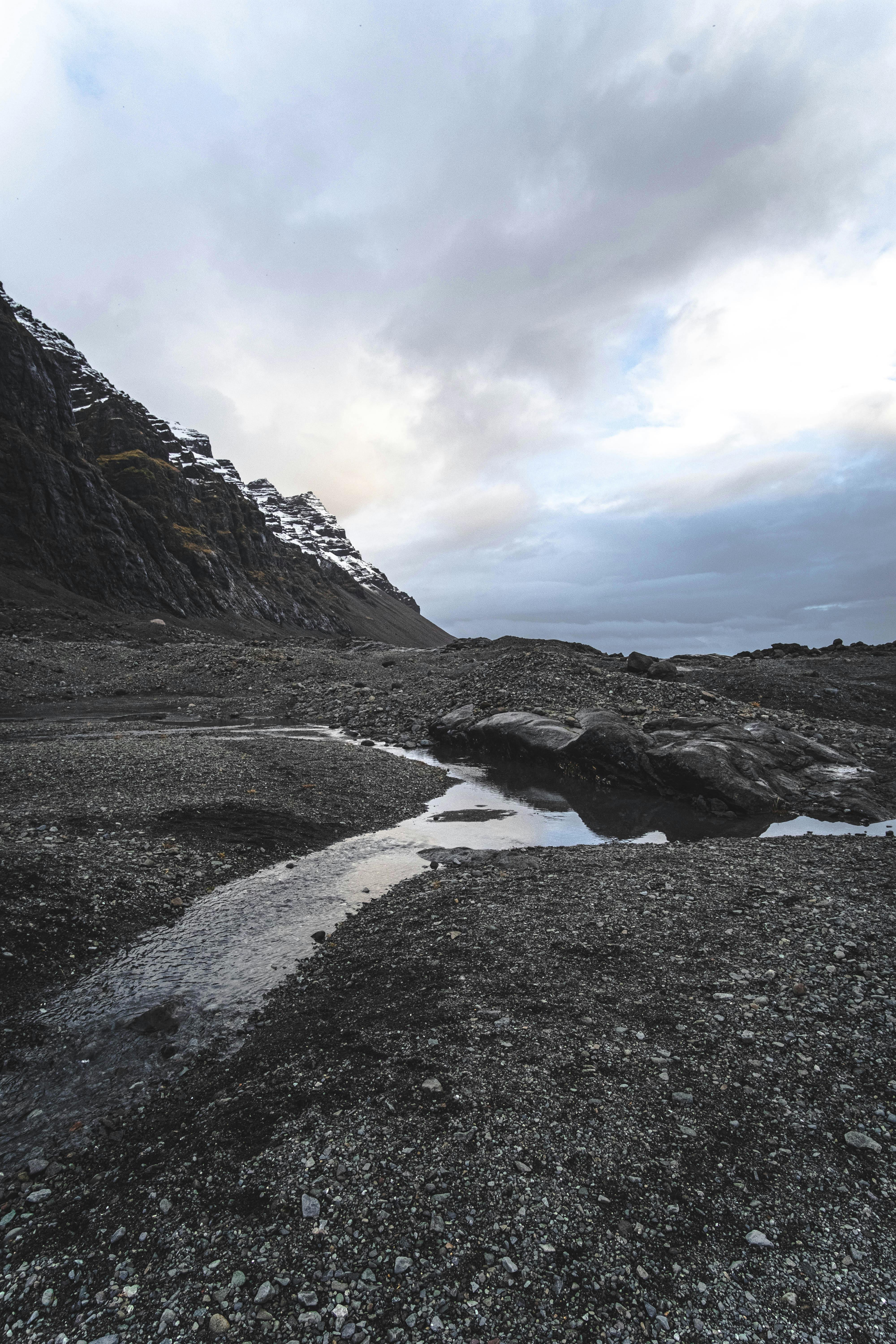 Barren Rocks around Stream in Winter · Free Stock Photo