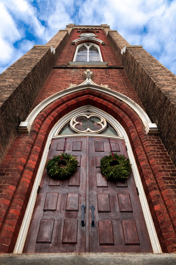 Low Angle Shot Of A Building With Double Doors