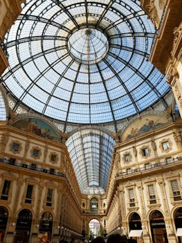 Explore the architectural marvel of Galleria Vittorio Emanuele II's glass dome in Milan.