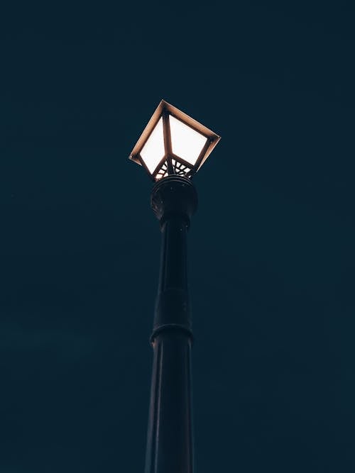 Black Street Light Post during Night Time