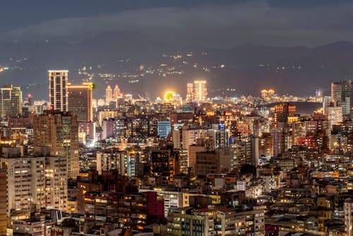 Aerial View of City Buildings at Night