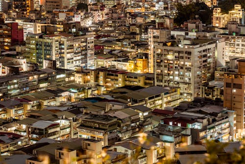 Aerial View of City Buildings at Night