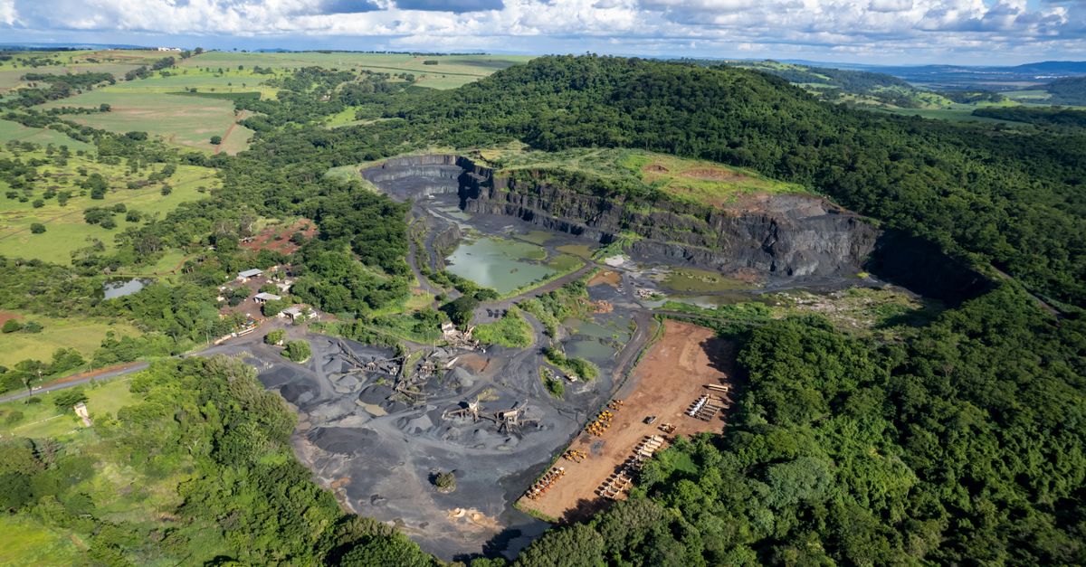Aerial View of a Mine Surrounded by Green Fields and Trees · Free Stock ...