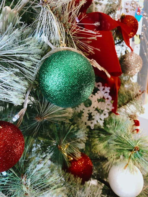 Close-Up Shot of Christmas Balls on a Christmas Tree