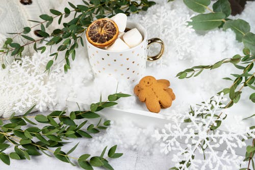 Free 
Gingerbread Cookies beside a Hot Beverage Stock Photo