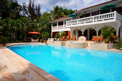 Red Outdoor Chair Near in Swimming Pool