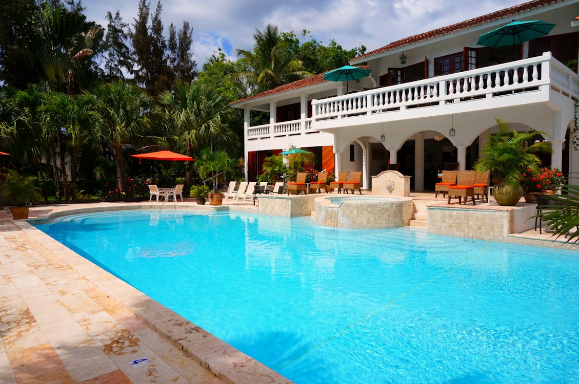 Red Outdoor Chair Near in Swimming Pool